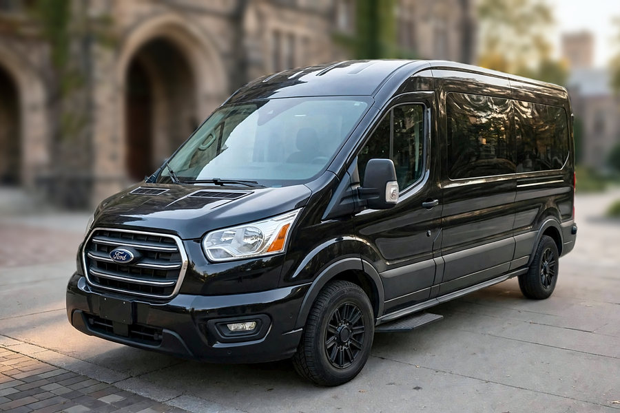 Black Ford Transit 250 van for group transportation, seats 10 passengers