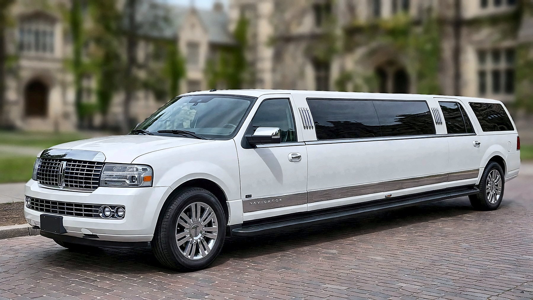 The white 12-passenger Lincoln Navigator Stretch Limousine, coach-built by Tiffany